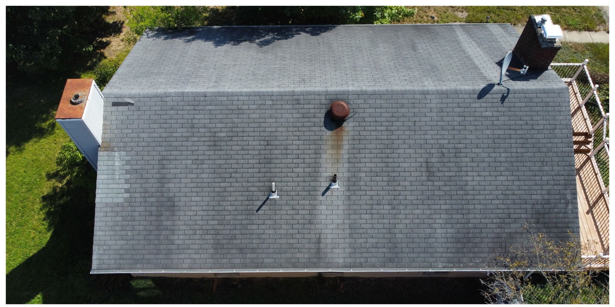 SmartPick AI technology scanning a Columbus Ohio roof via satellite wireframes on a laptop screen