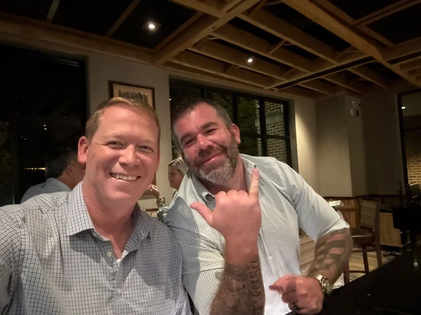 Two OpenbooQ founders in a restaurant
